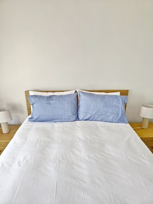 queen-size bed with side tables